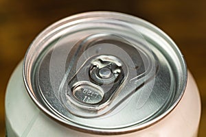 Macro detail of metallic beer can, view from the top