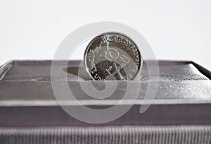 Macro detail of a silver coin of Dirham (United Arab Emirates Dirham, AED)