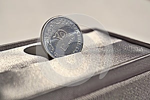 Macro detail of a silver coin of Dirham (United Arab Emirates Dirham, AED)