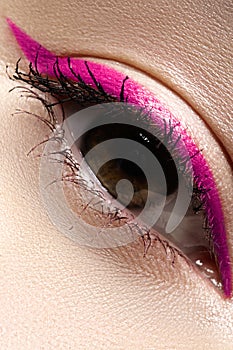 Macro eye with fashion bright eyeliner make-up