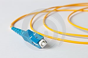 Macro Fiber optic patchcord on white background