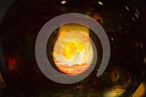 Filament of a lighted electric light bulb