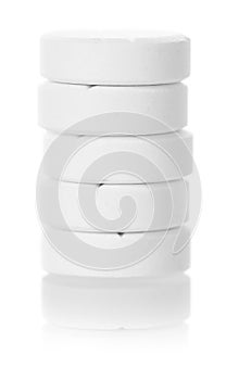 Macro. Five tablets isolated on white background