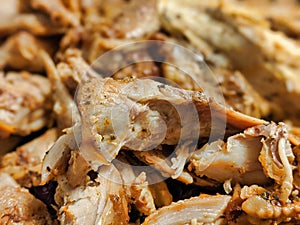 Macro focus on shredded up cooked turkey meat