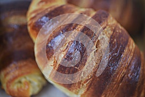 Macro food photography of homemade breakfast croissants made with buttery flaky pastry for an abstract pattern image