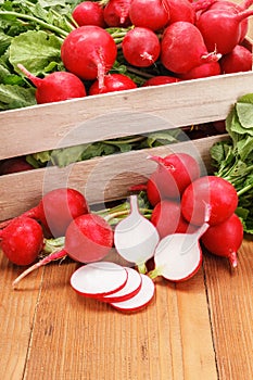 Macro of fresh sliced radish in crate