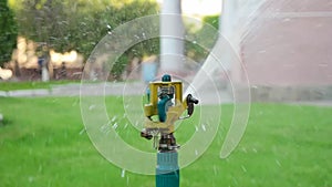 Macro of garden sprinkler working slowmo footage