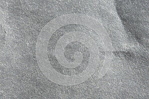 Macro image of gray newsprint