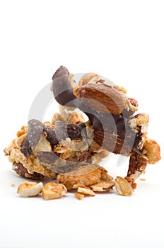 Macro Image of Nuts and Chocolate Snacks Isolated on White