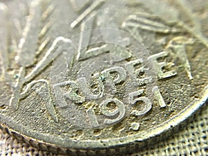 Macro image of old Indian rupee currency in 1951