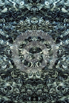 Macro image of a textile material,  symetrically reflected