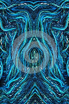 Macro image of a textile material symmetricaly reflected