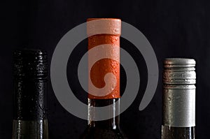 Macro Image of Wine Bottle Tops with Black Background