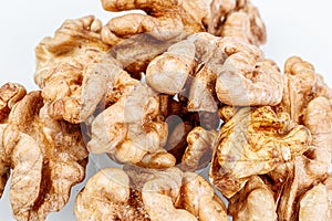 Macro juglandaceae nuts, walnut on a white background