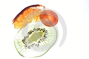 Macro kiwi wortel mandarijn photo