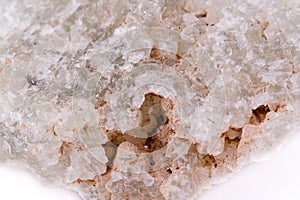 Macro mineral prehnite stone on a white background
