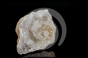 Macro mineral quartz snow stone on a black background