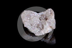 macro mineral stone angel aura quartz crystal on a black background