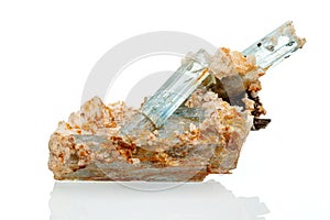 Macro mineral stone aquamarine on a white background