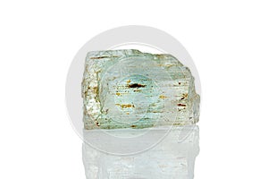 Macro mineral stone aquamarine on a white background