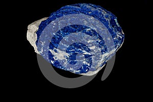 Macro mineral stone Azurite in siltstone against black background