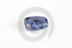 Macro mineral stone blue Lazurite on white background