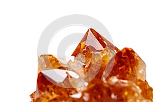 Macro mineral stone Citrine in rock in crystals on a white backg