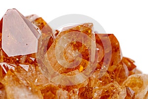 Macro mineral stone Citrine in rock in crystals on a white backg