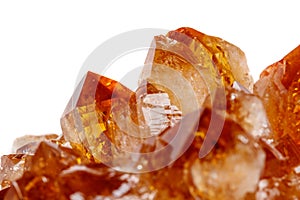 Macro mineral stone Citrine in rock in crystals on a white backg