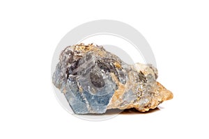 Macro mineral stone Corundum in rock a white background