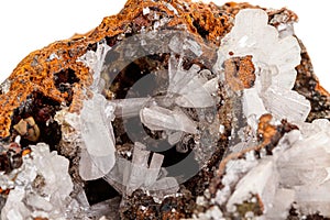 Macro mineral stone crystals Hemimorphite rock on a white background