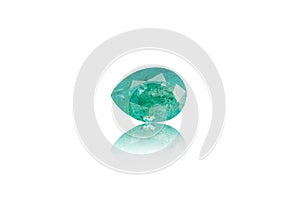 Macro mineral stone cut emerald on a white background