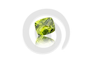 Macro mineral stone cut Peridot on a white background