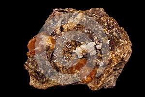 Macro mineral stone Grossular, Garnet, Epidote on a black background