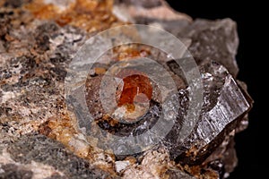 Macro mineral stone Grossular, Garnet, Epidote on a black background