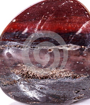 Macro mineral stone jasper on a white background