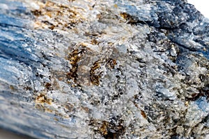 Macro mineral stone Kyanite a white background