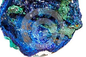 Macro mineral stone malachite with azurite on white background