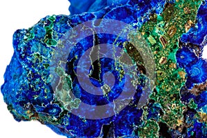 Macro mineral stone malachite with azurite on white background