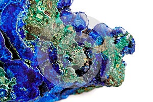 Macro mineral stone malachite with azurite on white background