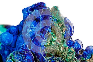 Macro mineral stone malachite with azurite on white background