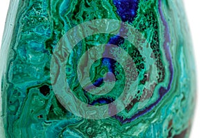 Macro mineral stone malachite with azurite on white background