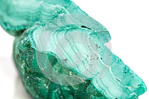 Macro mineral stone Malachite in the rock on a white background