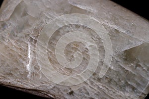 Macro mineral stone Moonstone on black background