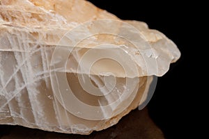 Macro mineral stone Moonstone a black background