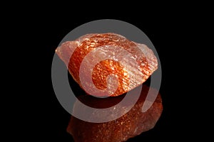 Macro mineral stone Nepheline sunny stone black background photo