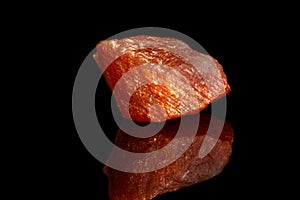 Macro mineral stone Nepheline sunny stone black background photo