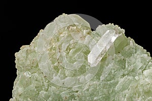 Macro mineral stone Prehnite quartz on a black background