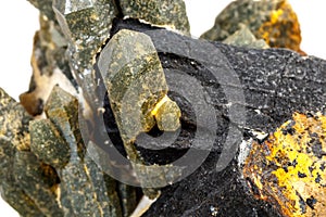 Macro mineral stone Quartz Hedenbergite Prase on ilvite on a white background