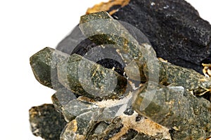 Macro mineral stone Quartz Hedenbergite Prase on ilvite on a white background